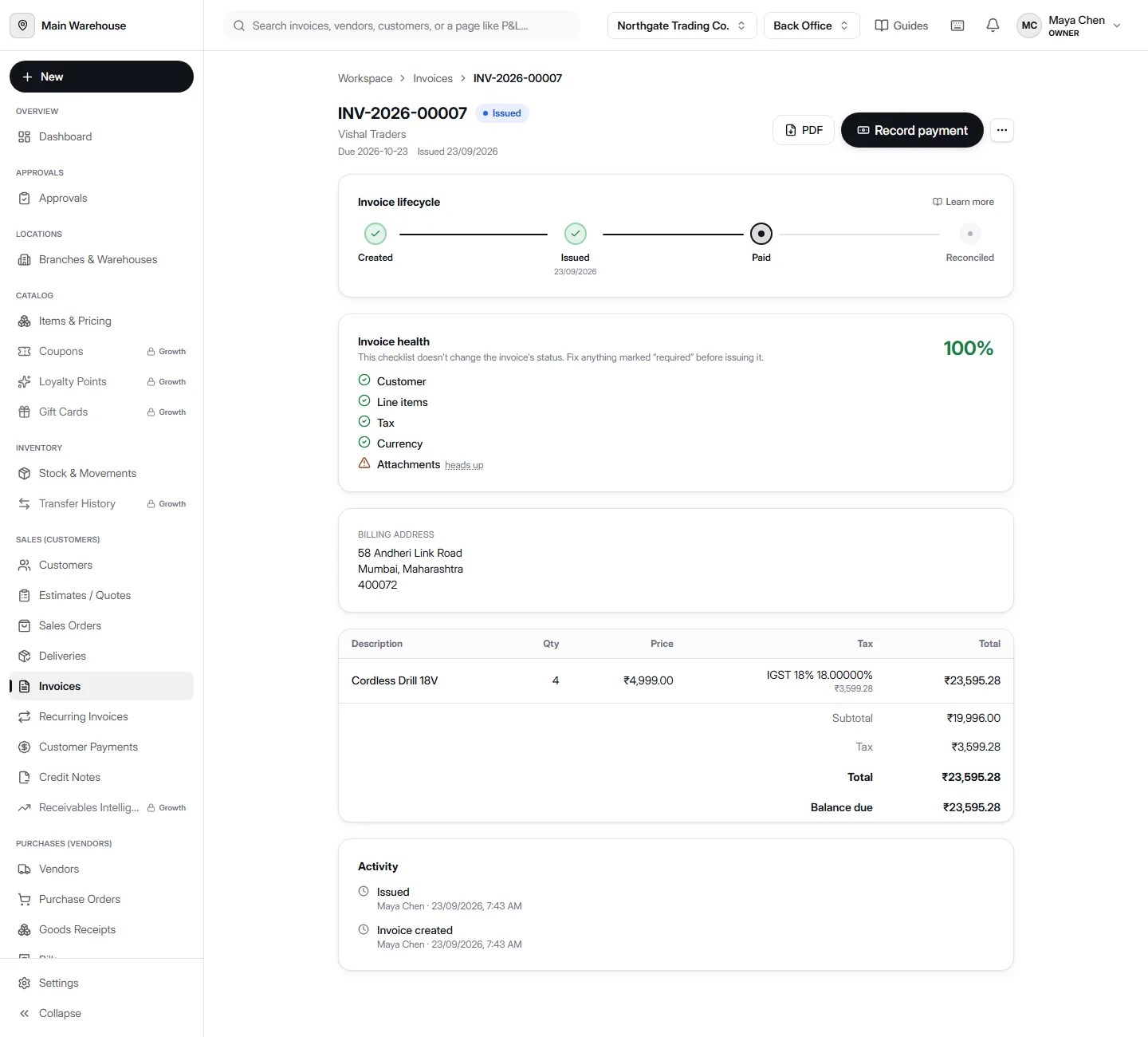 An issued invoice in AccountDesq showing IGST 18% calculated on a line item, with tax, subtotal, and total broken out, and an invoice health score of 100%